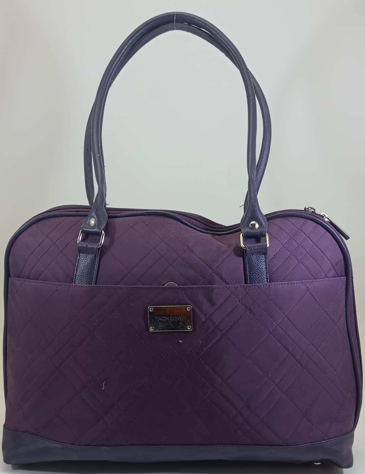 Purple Simon Chang Hand bag