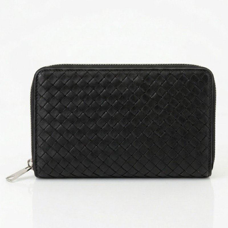 The Classic Black Woven Clutch