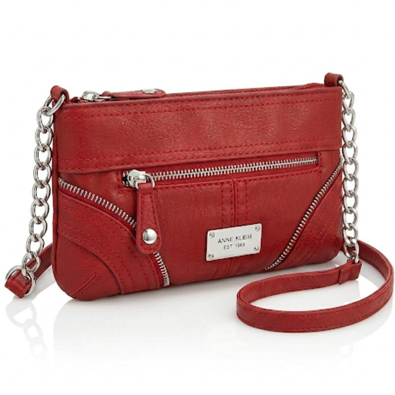 Anne Klein red crossbody bag with silver-tone chain straps and zipper details.