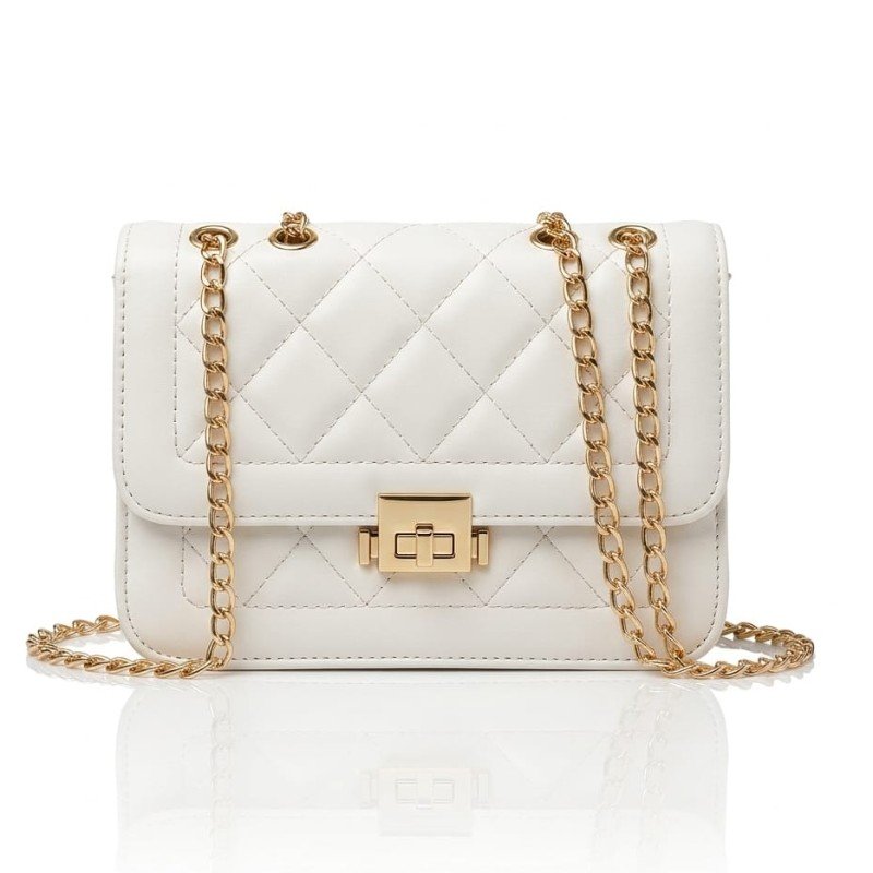 White quilted mini bag featuring a gold turn-lock closure and a matching gold chain strap.