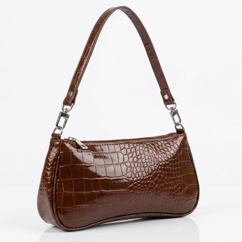 This glossy brown shoulder bag features a 90s-inspired croc-embossed texture and sleek silver hardware