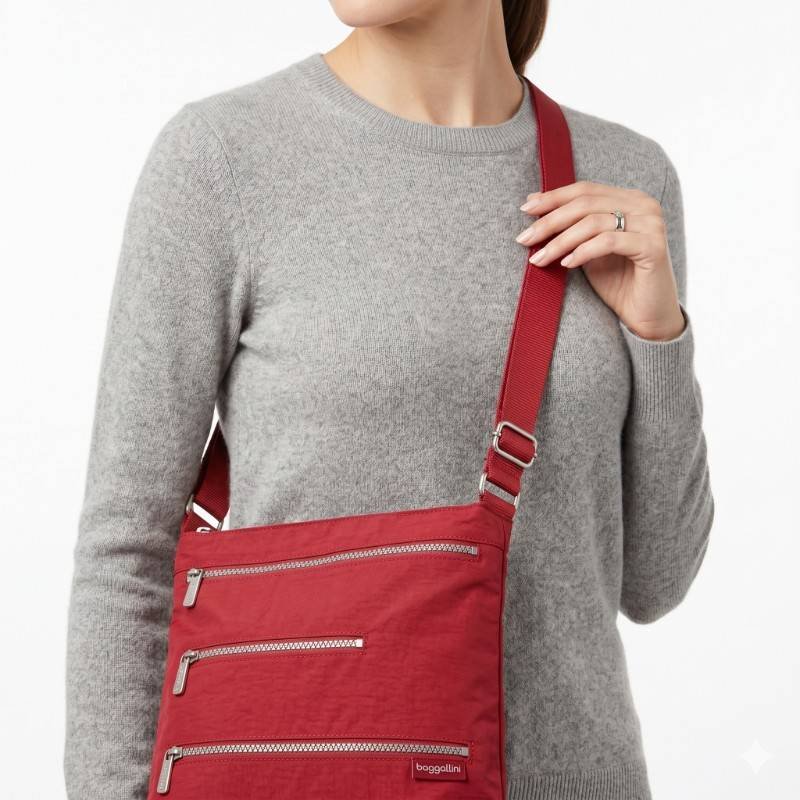 red nylon Baggallini crossbody bag with multiple zipper pockets. - view 2