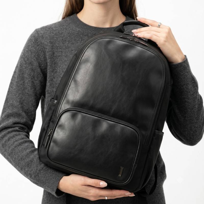 black backpack appears consistent with models - view 2